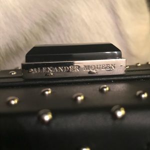 Alexander McQueen black leather studded bag.